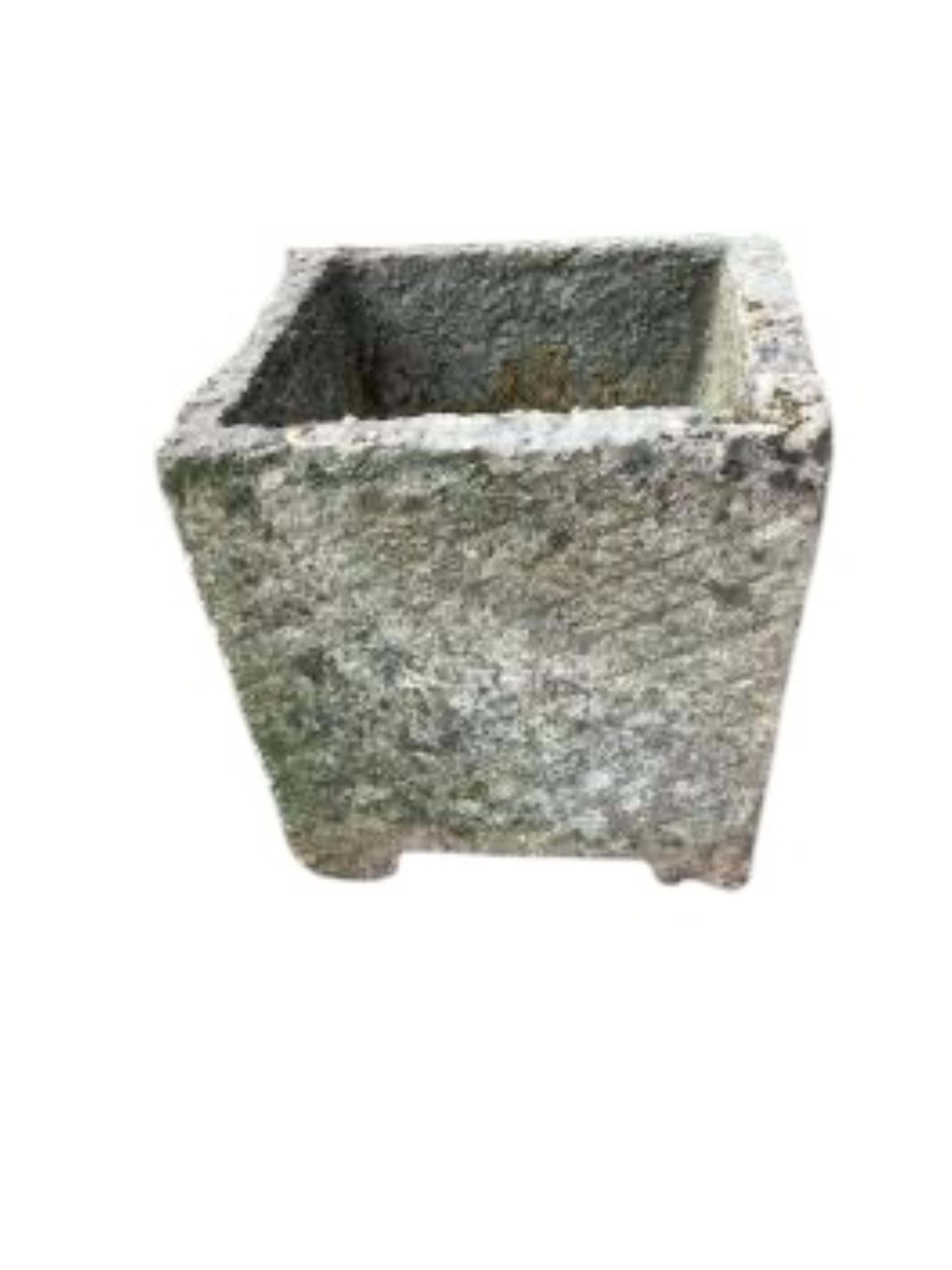 Six assorted stone and earthenware garden planters and a bird bath, largest diameter 38cm, height 32cm